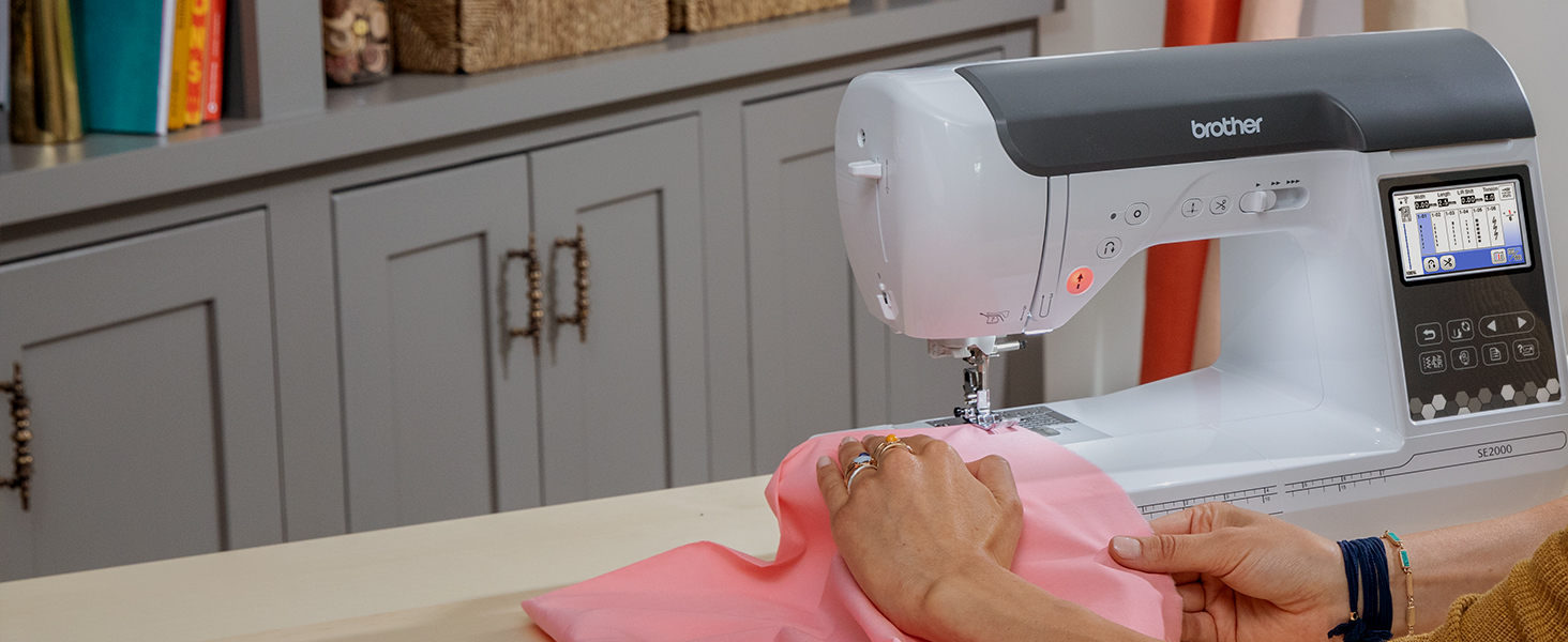 Woman sewing hem on machine, with stitch settings shown on LCD touchscreen