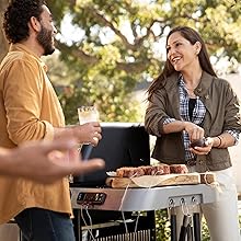 People Grilling on Weber Genesis Smart Grill