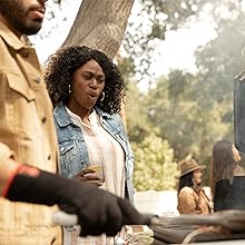 People grilling on Weber Genesis Gas Grill