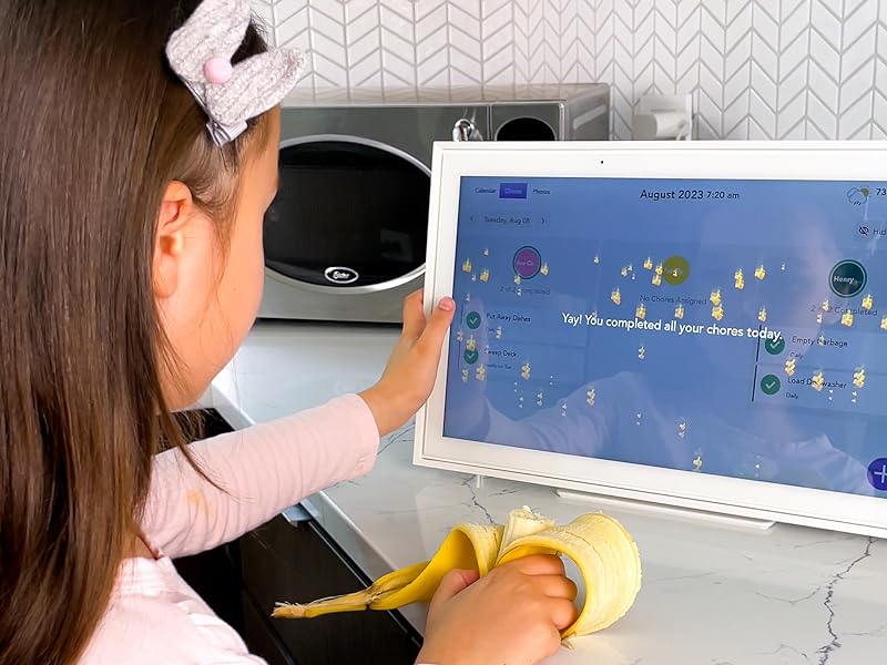 Kid finishing chores on chore chart